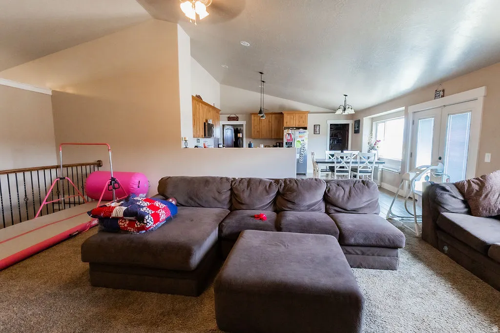 Open-concept living space with vaulted ceilings