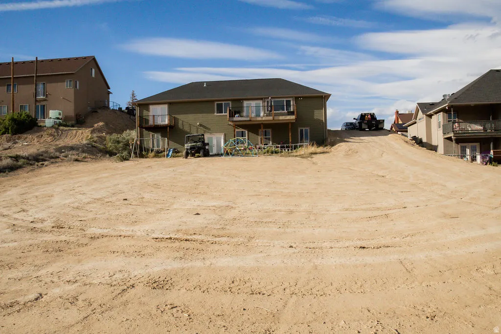 Expansive graded lot offering a clear building site
