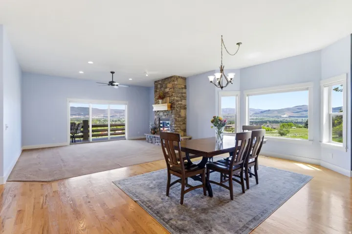 Bright, open-concept living space with expansive mountain scenery