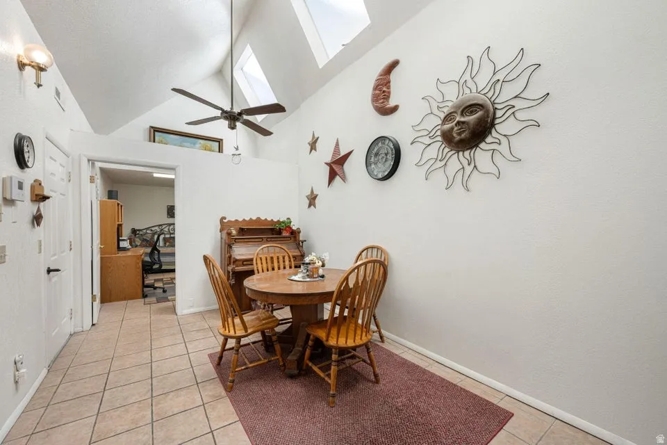 Vaulted ceilings with skylights and ceiling fan