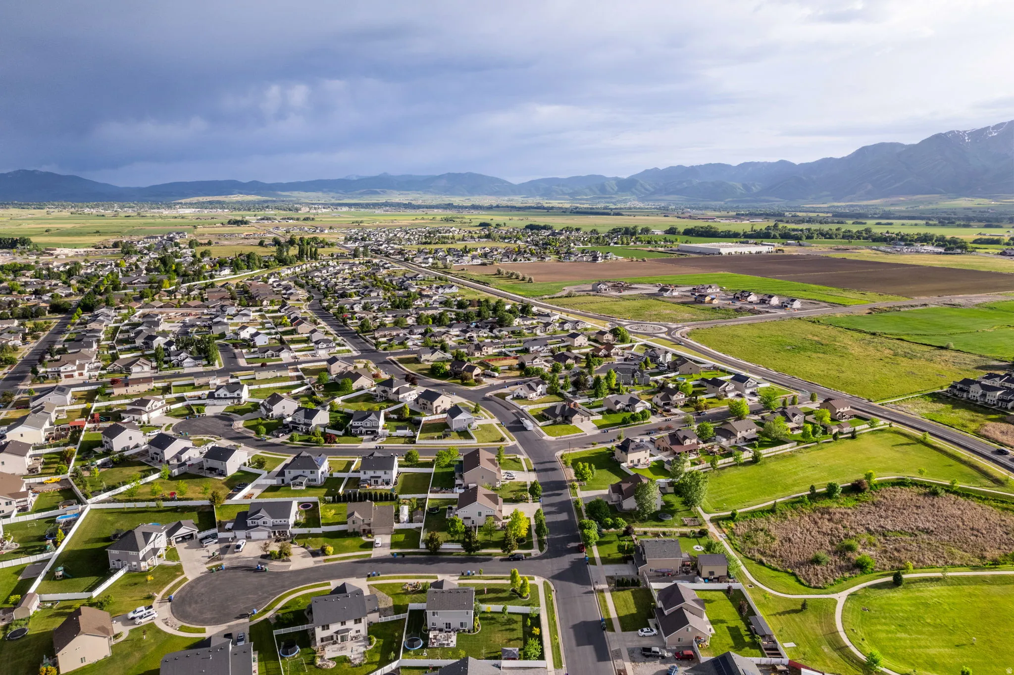 Expansive suburban development featuring a network of streets and numerous single-family homes