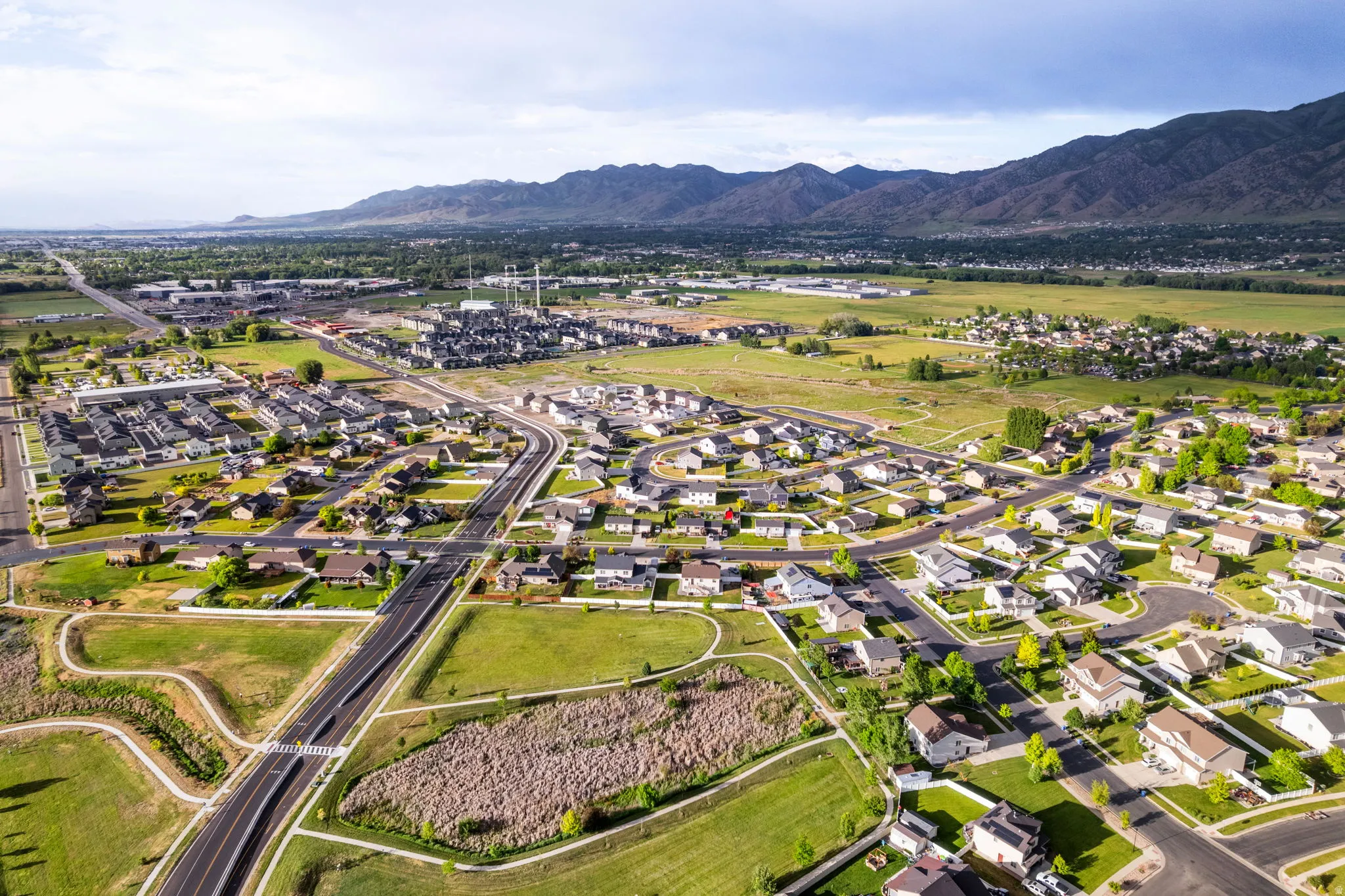 Aerial perspective showcasing a residential development with varied housing styles