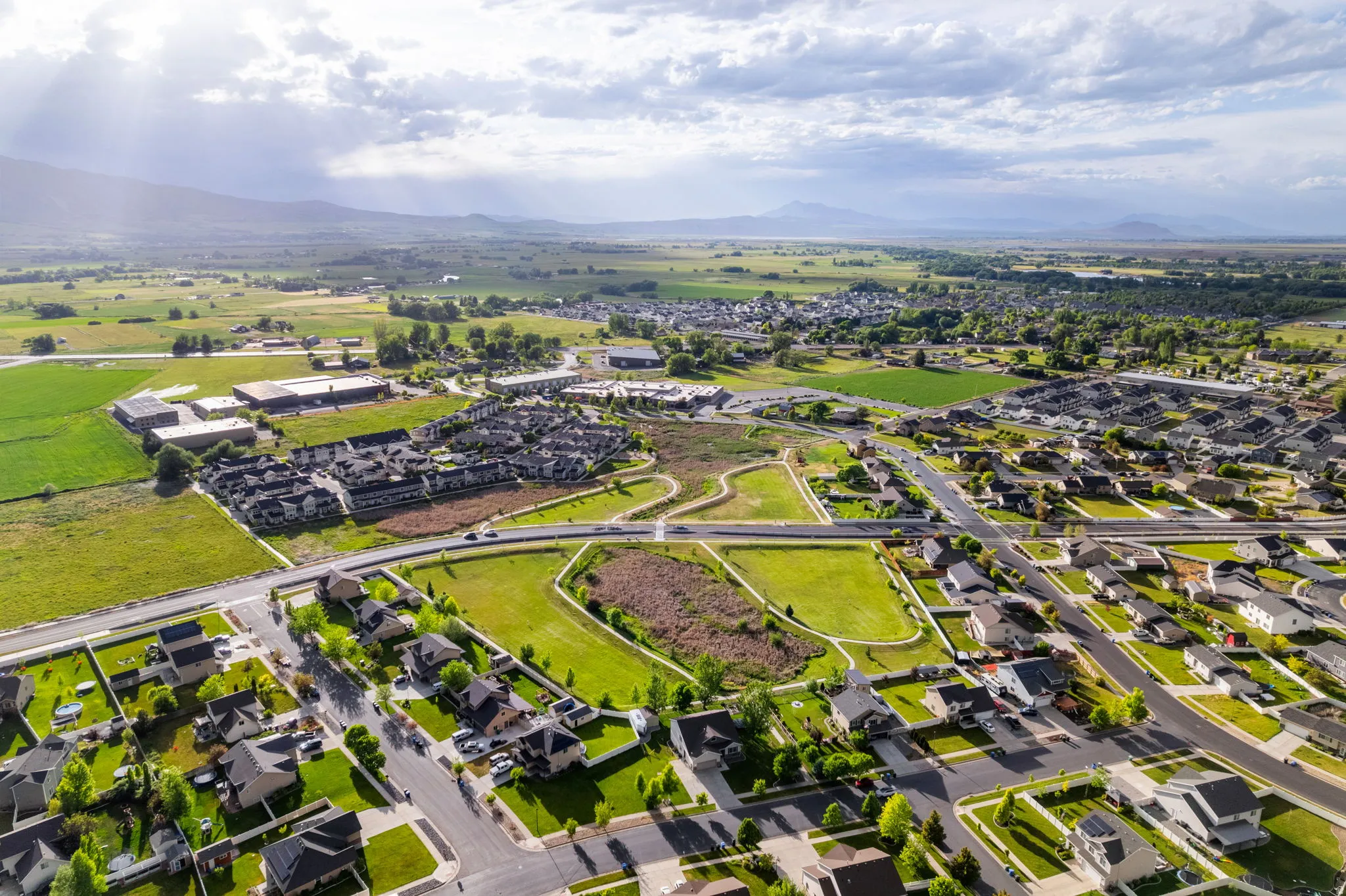 Aerial perspective showcasing a developed residential area with varied housing styles