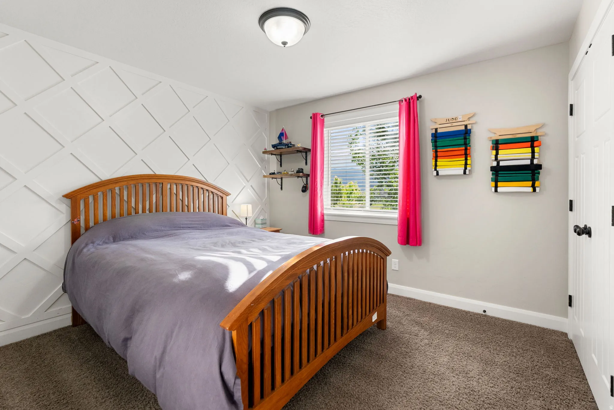 Accent wall with diamond-patterned millwork