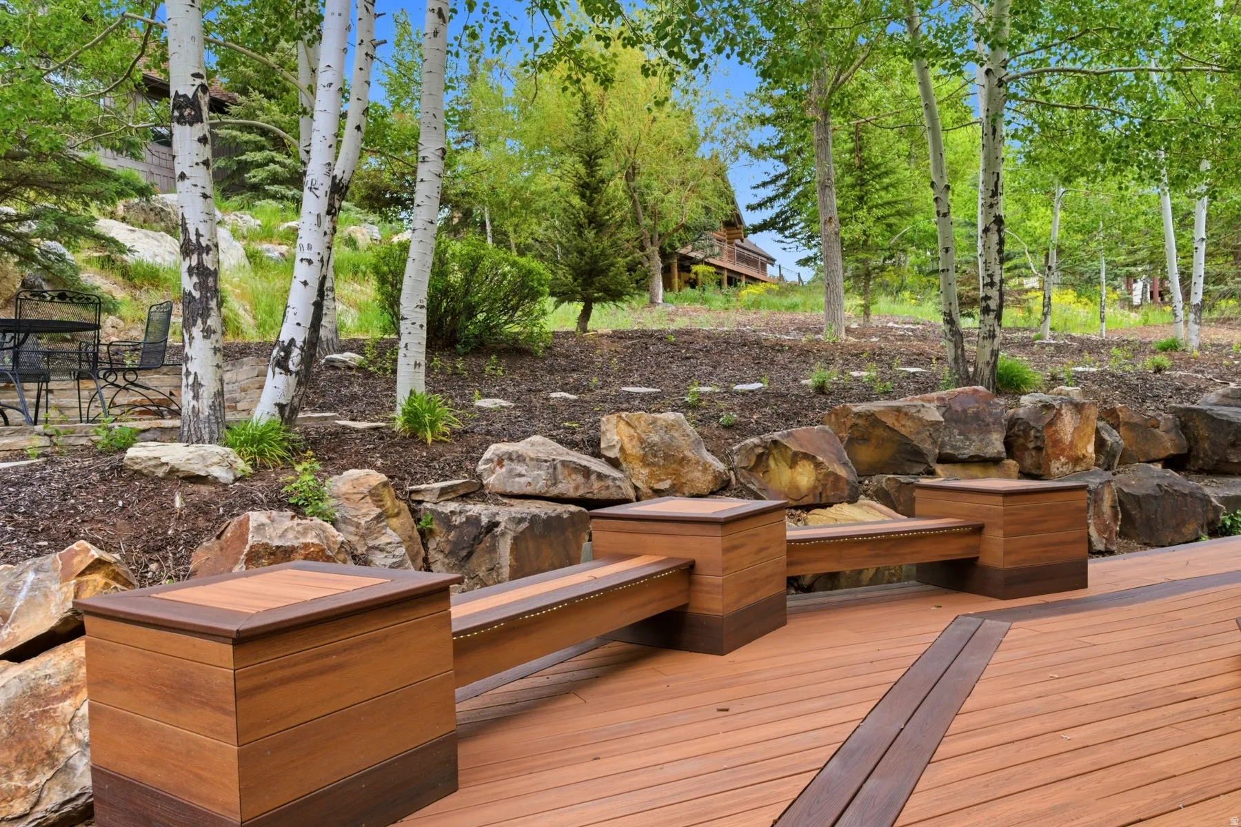 Expansive multi-tone composite decking featuring integrated seating