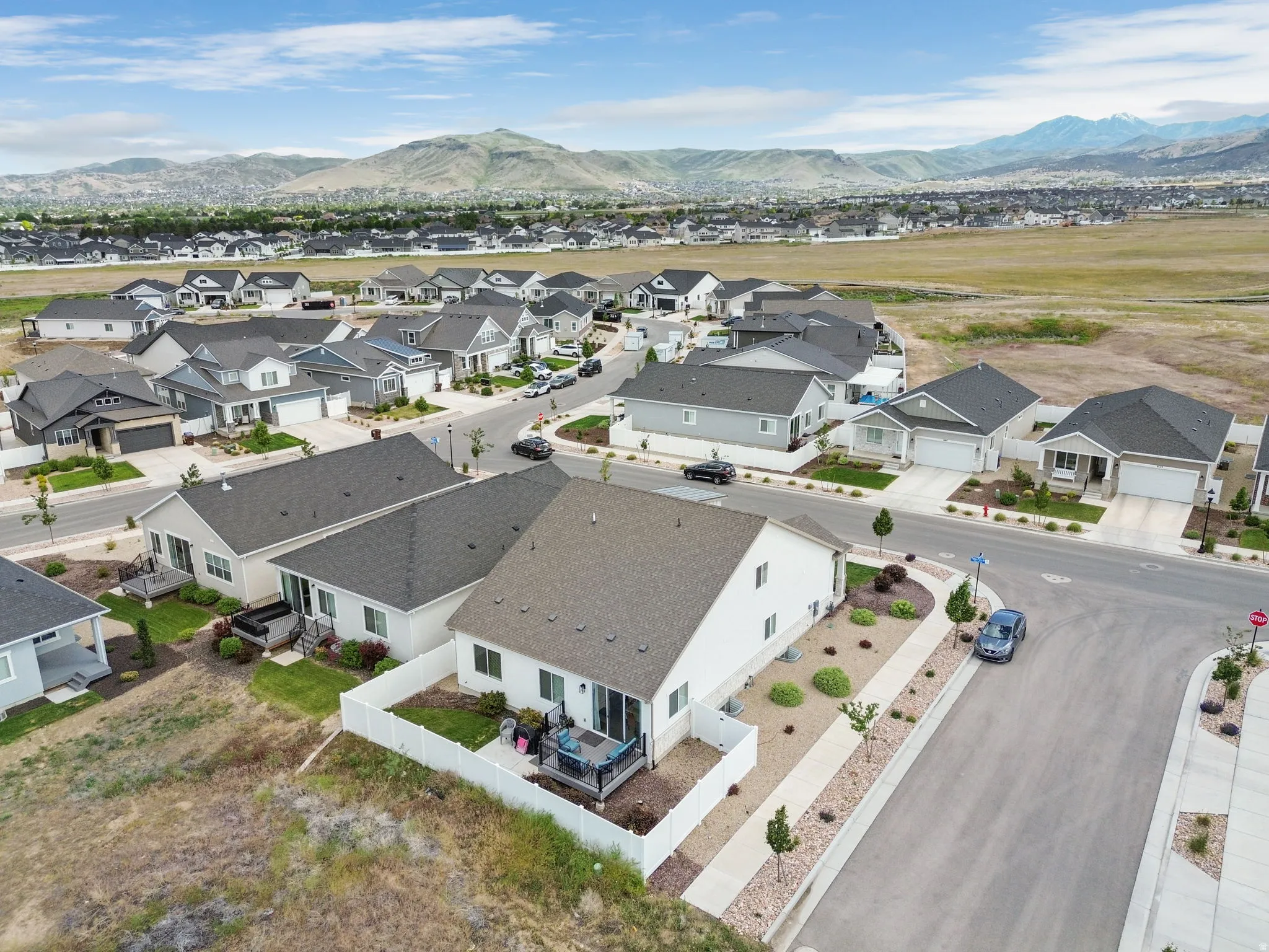 Contemporary suburban development featuring numerous single-family homes with varied architectural styles