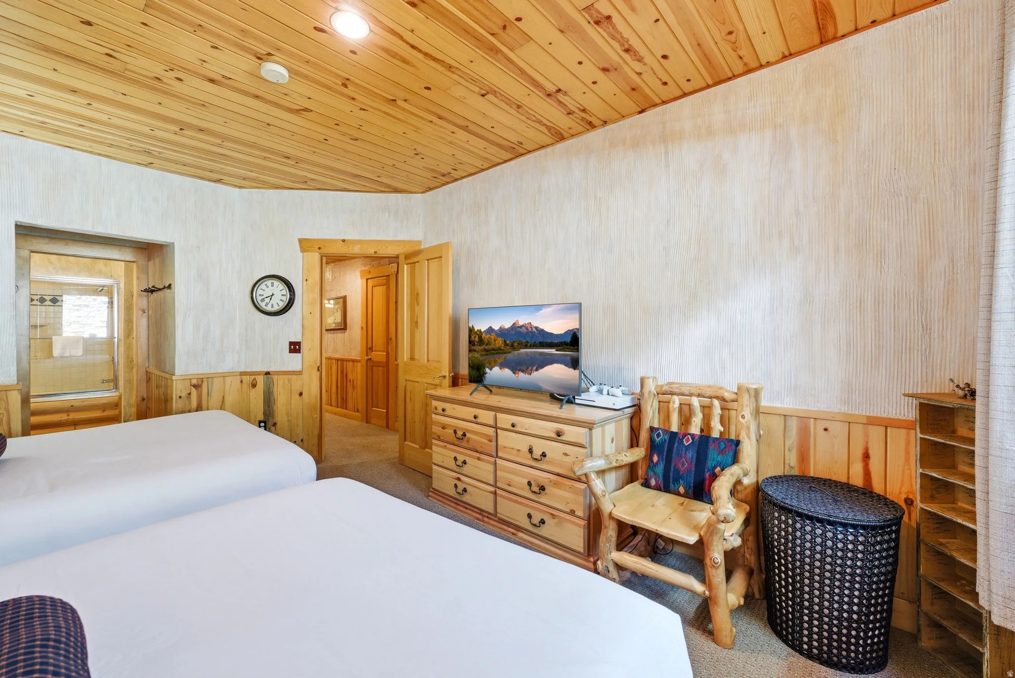 Wood-paneled ceiling with recessed lighting