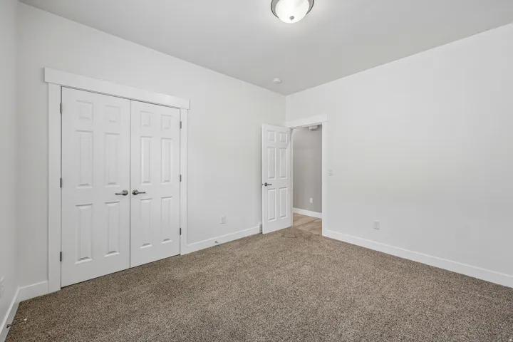 Neutral wall paint with contrasting white baseboards