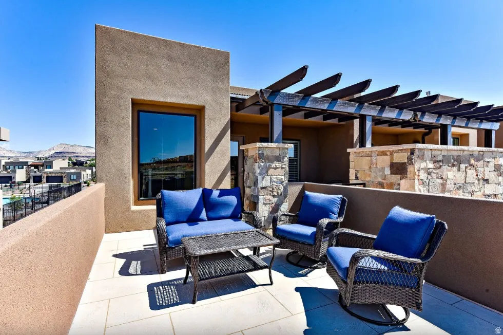 Expansive outdoor patio featuring light-colored tile flooring