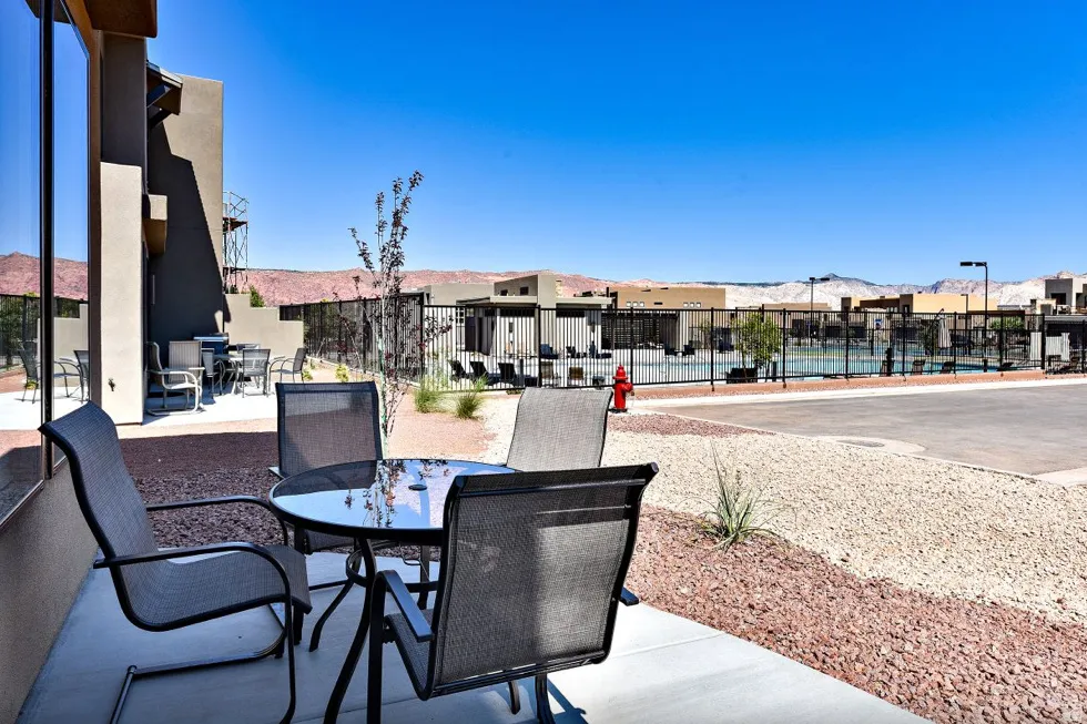 Private patio with concrete flooring