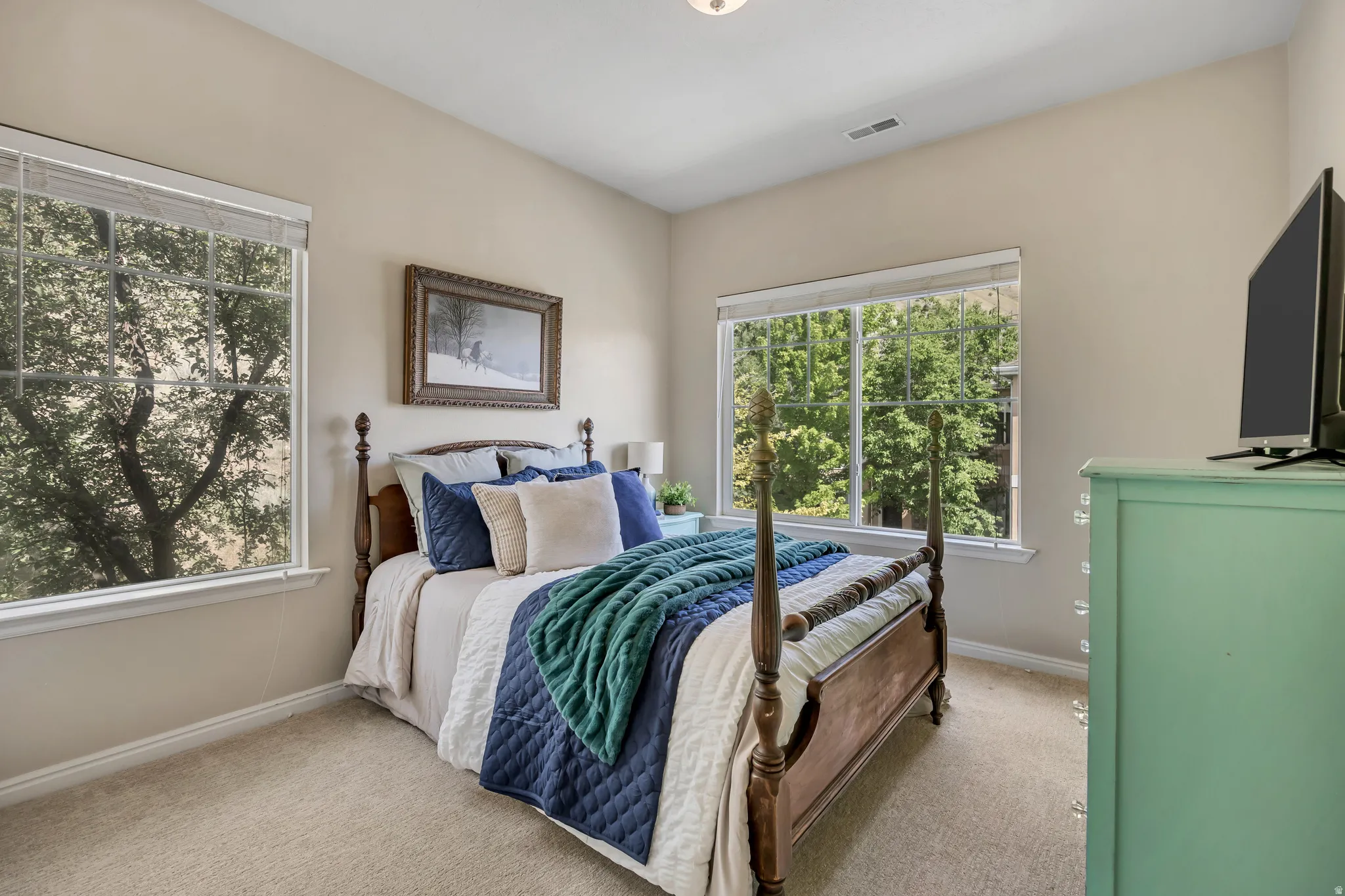 Bedroom 2 with large closet and big windows for natural light.