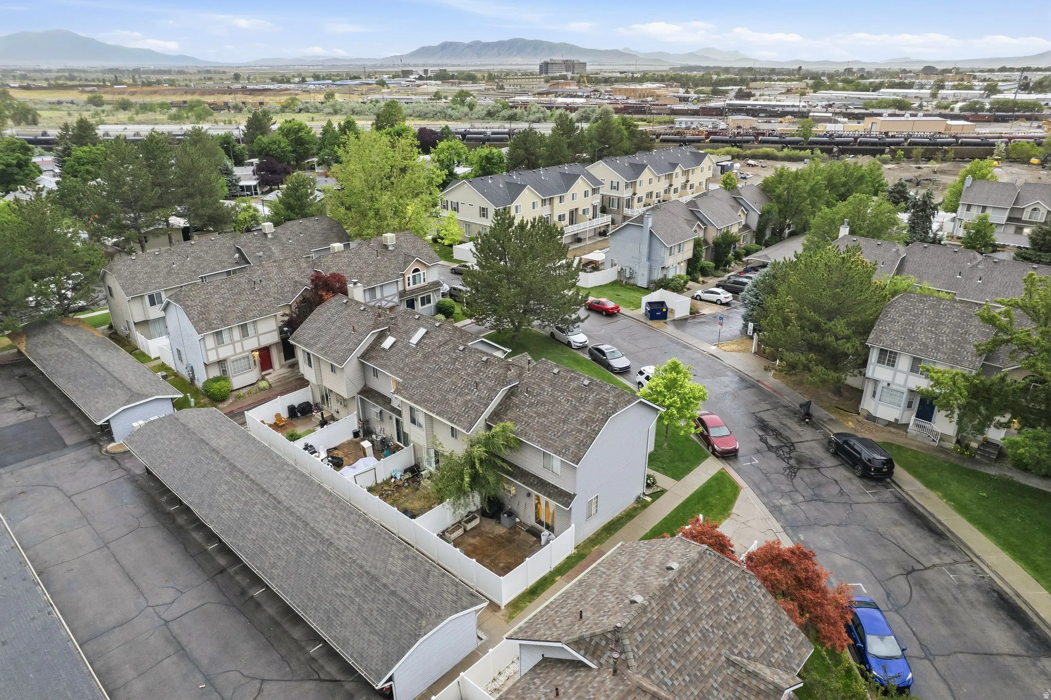Aerial perspective showcasing a residential community with multi-level townhomes