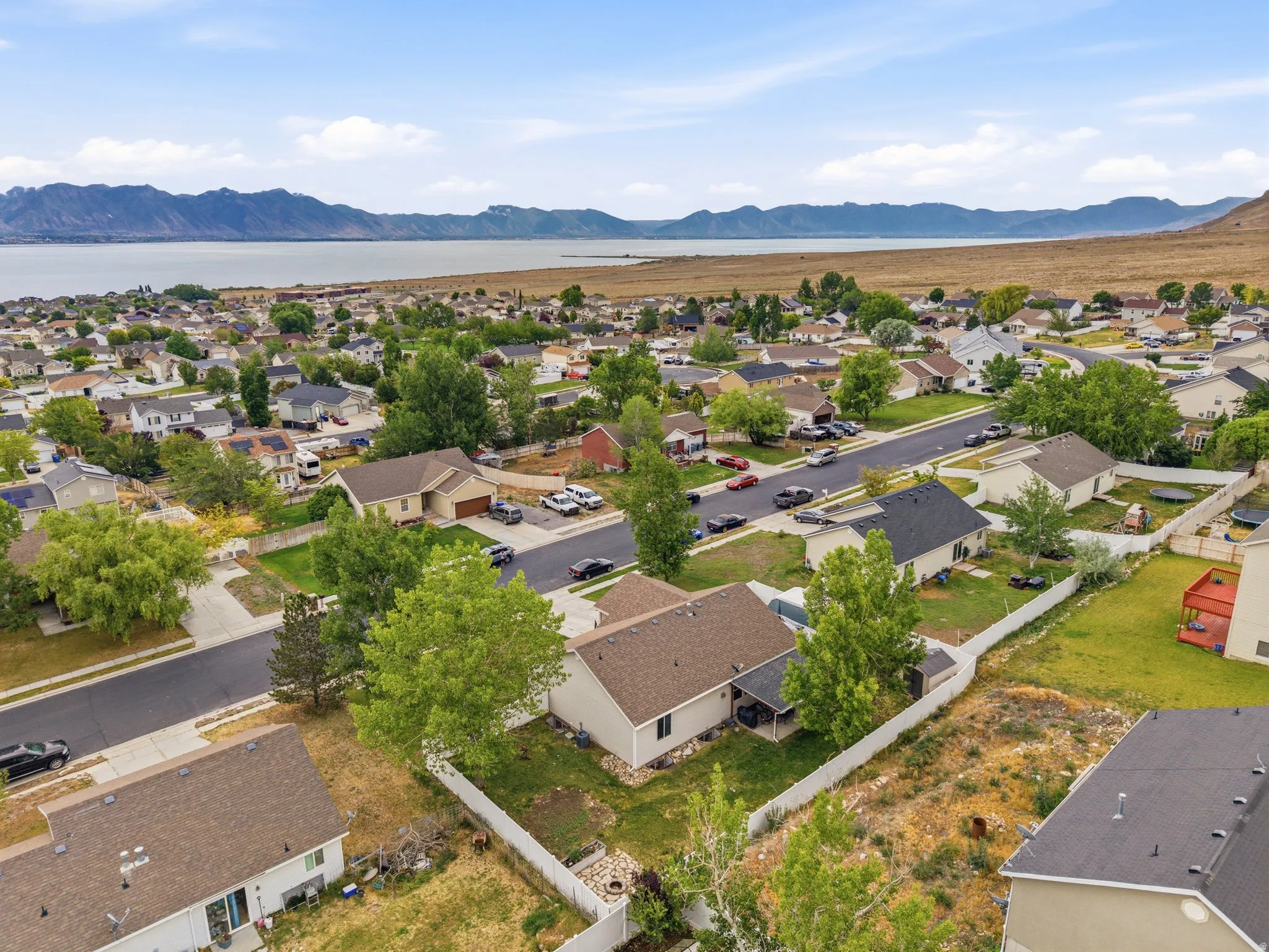 Residential neighborhood featuring single-family homes with pitched roofs