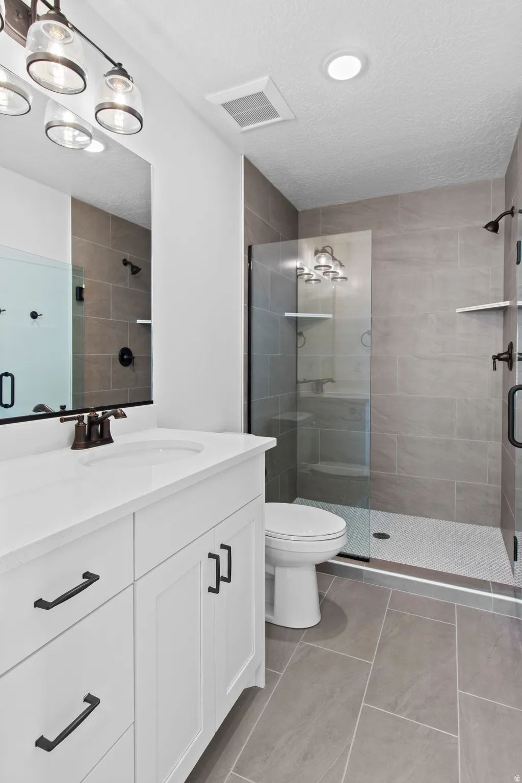 Bathroom featuring walk-in shower