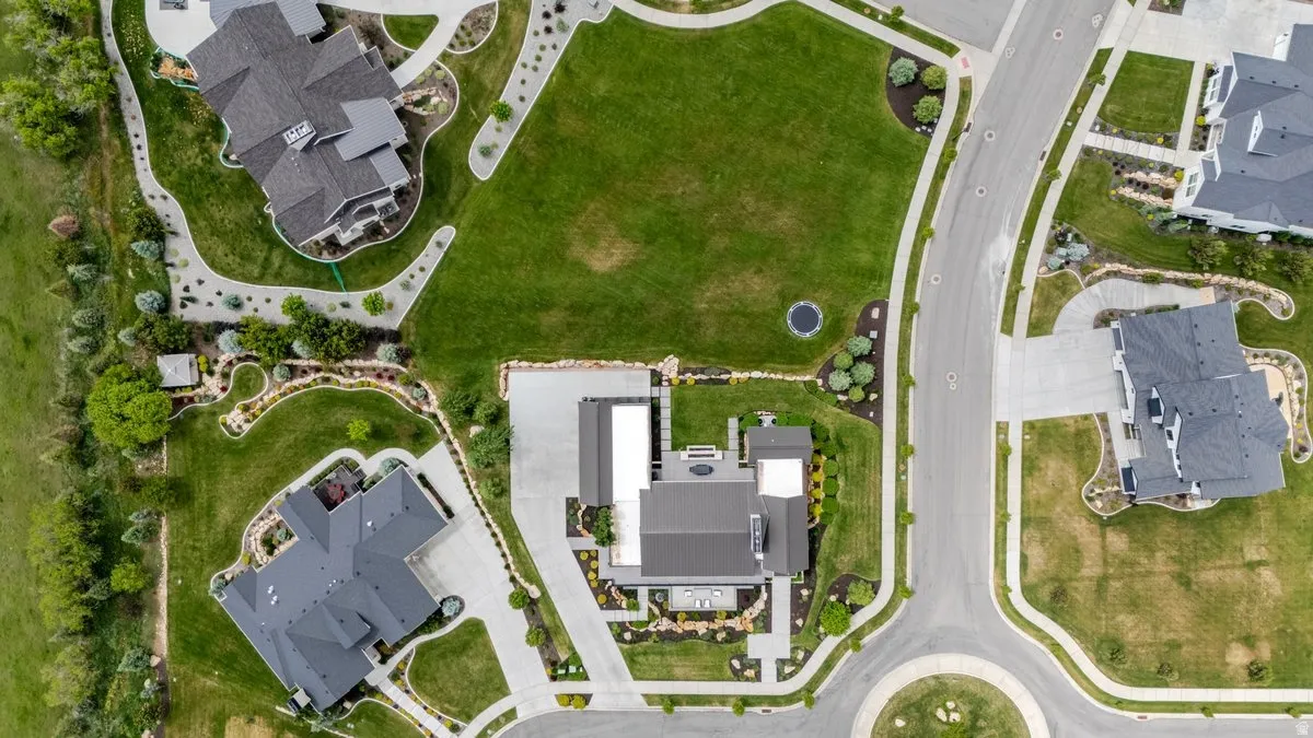 Contemporary aerial rendering showcasing a residential neighborhood with paved streets