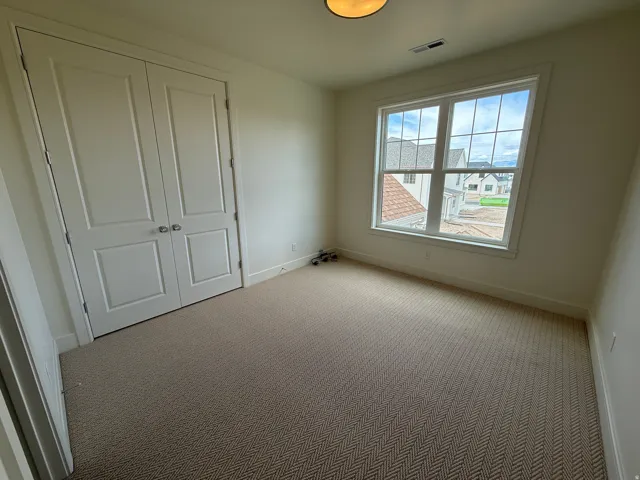 Double-door closet with polished hardware