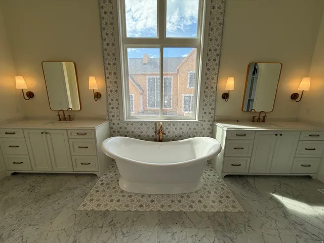 Dual vanity cabinets with stone countertops