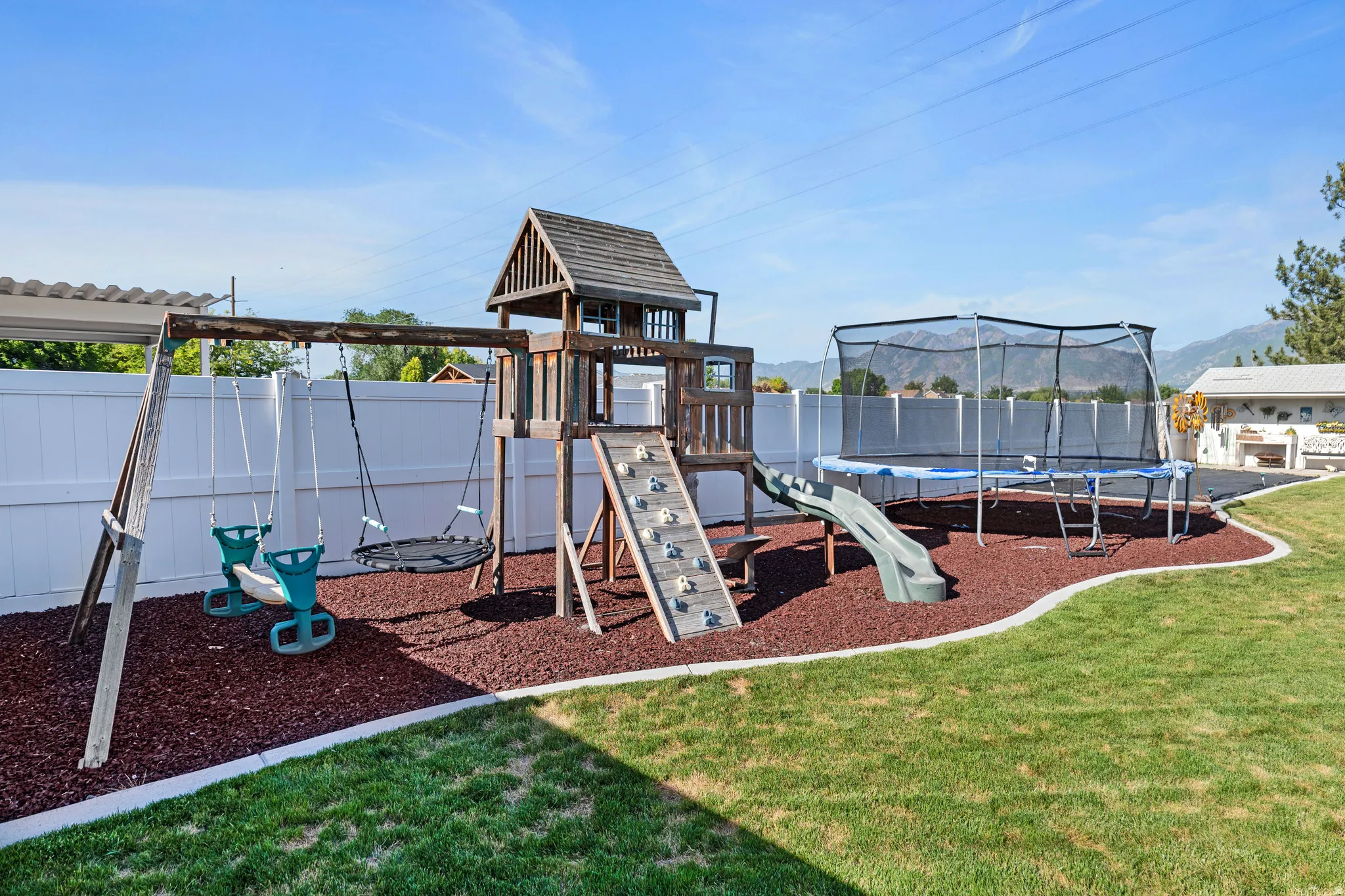 Play yard and trampoline included in sale.