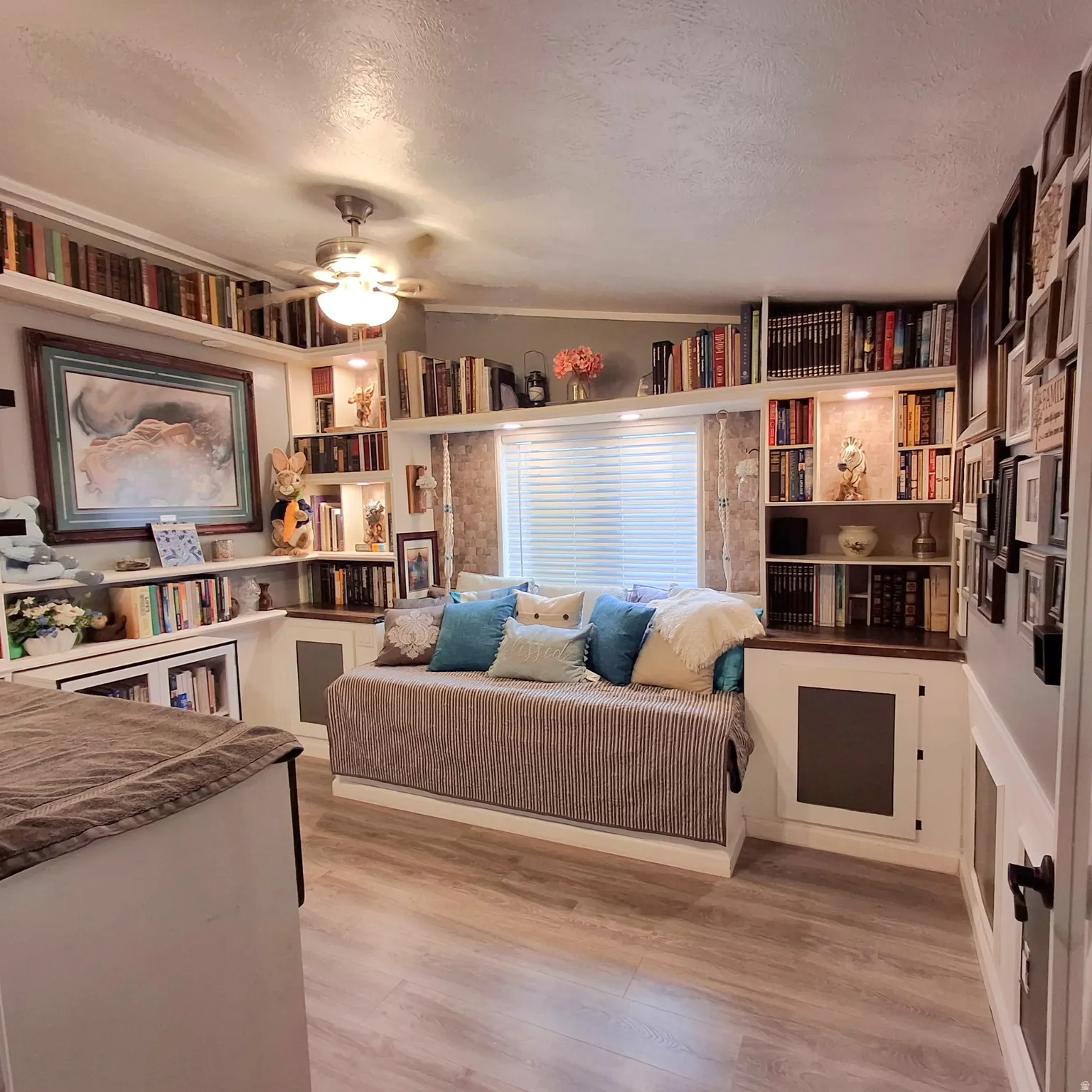 Built-in daybed with integrated storage and wood-finish flooring