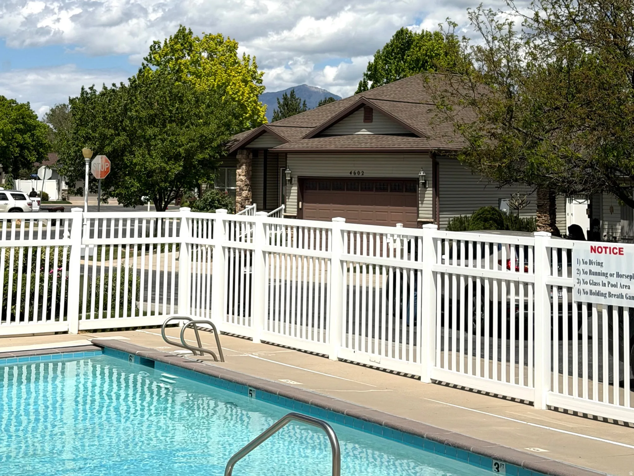 Subject home in the background. Great location and easy access to pool.