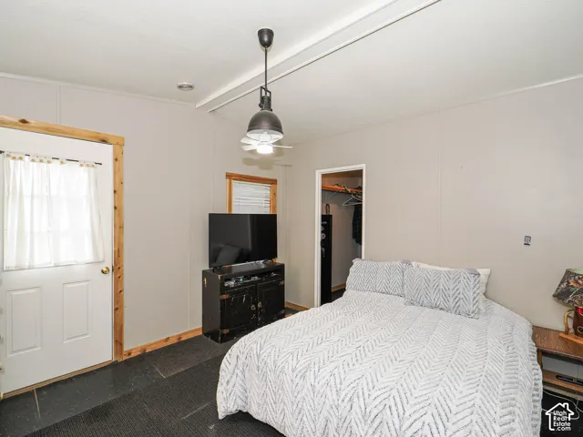 Neutral-toned walls complement the dark flooring in this room