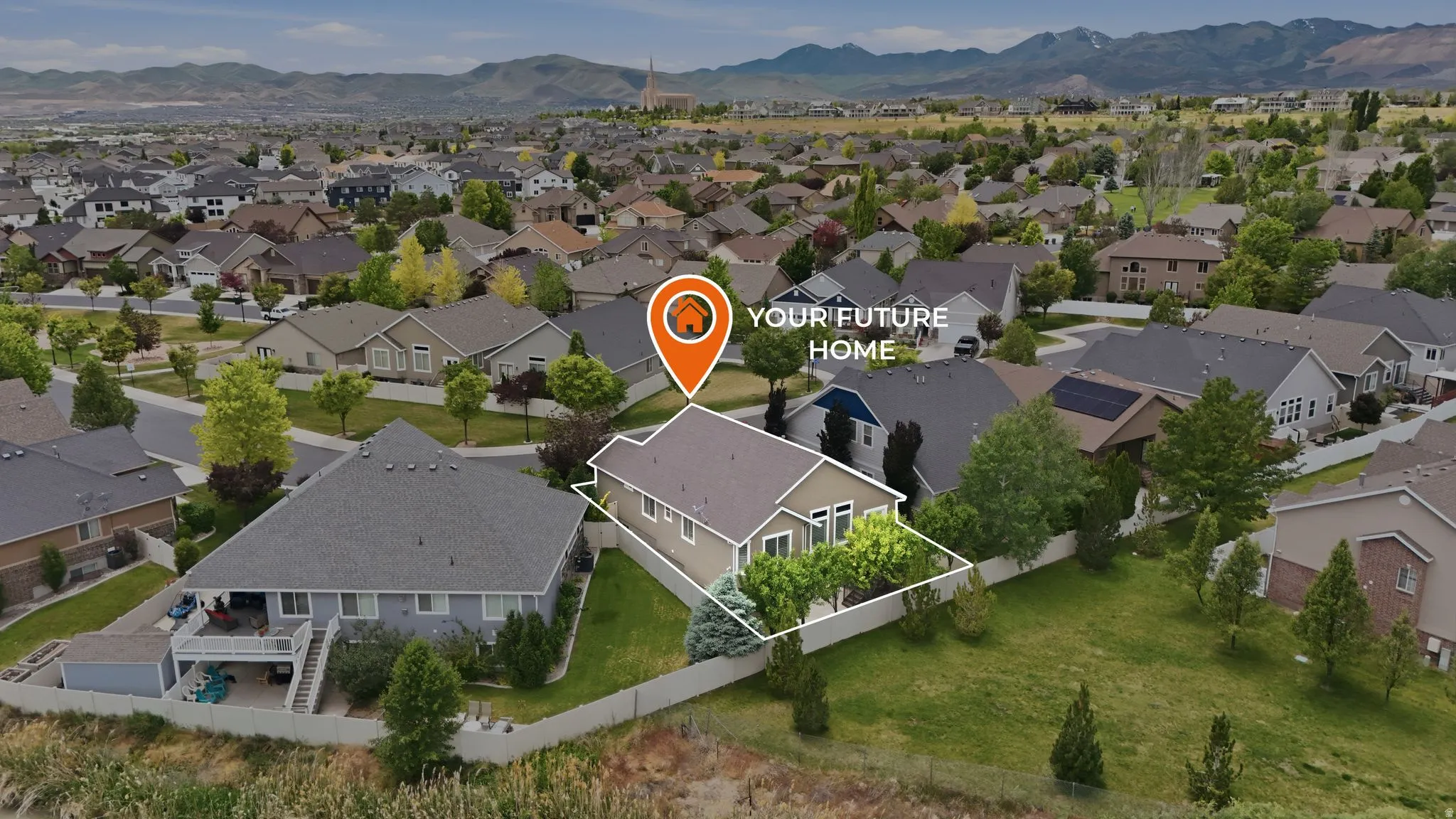Aerial perspective showcasing the residential neighborhood with a prominent single-story home