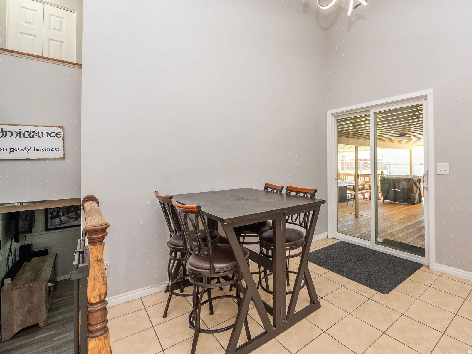 Dining room with new sliding glass door onto huge covered deck