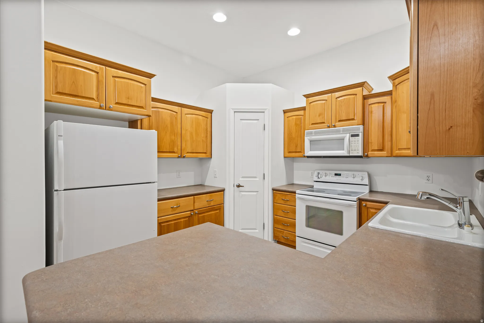 A corner pantry with plenty of room for your needs and small appliances