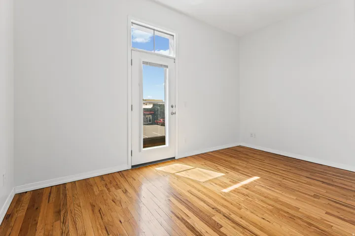 Door in bedroom opens to a Juliette balcony for some fresh air and sunshine
