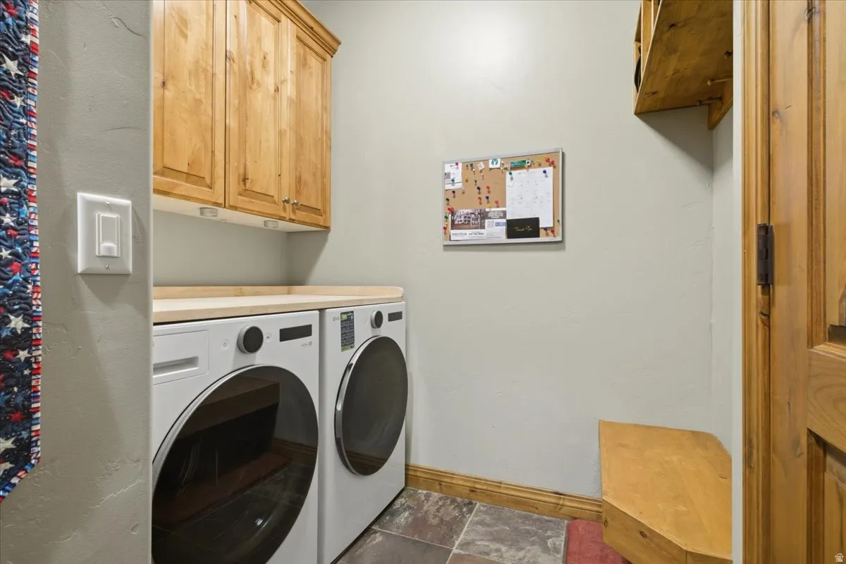 Laundry area featuring a side-by-side washer and dryer