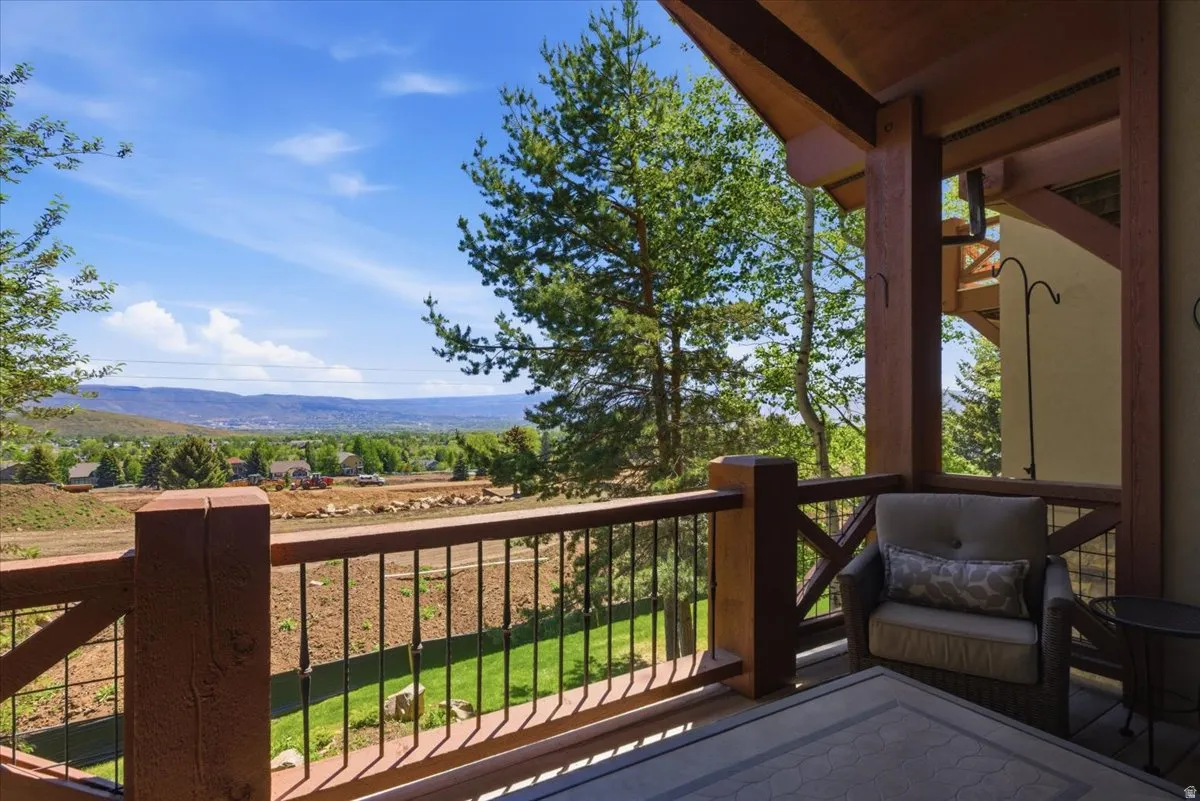 Spacious outdoor deck featuring a nice view of the Homestead Golf Course