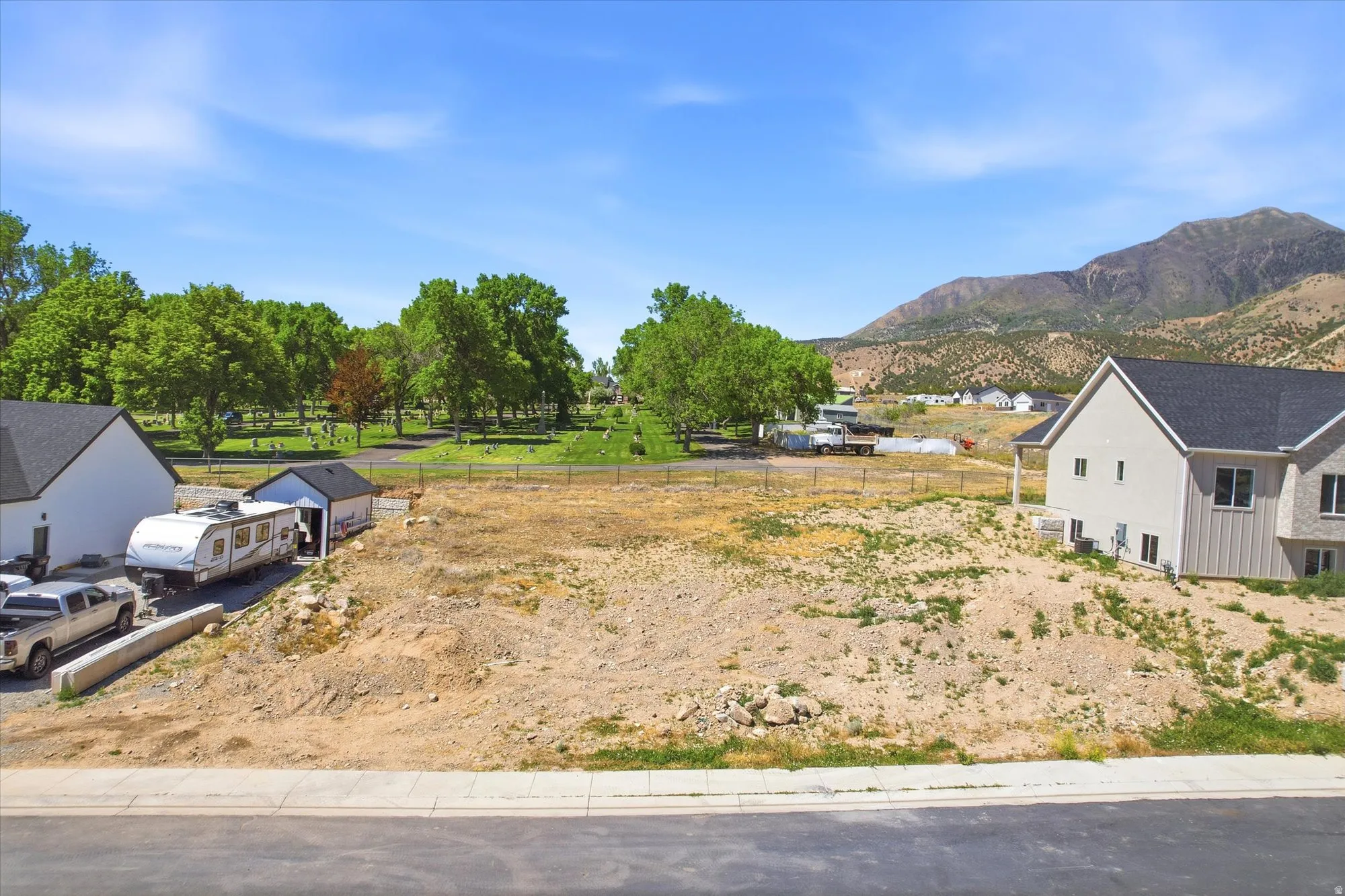 Generous undeveloped lot with mountain scenery