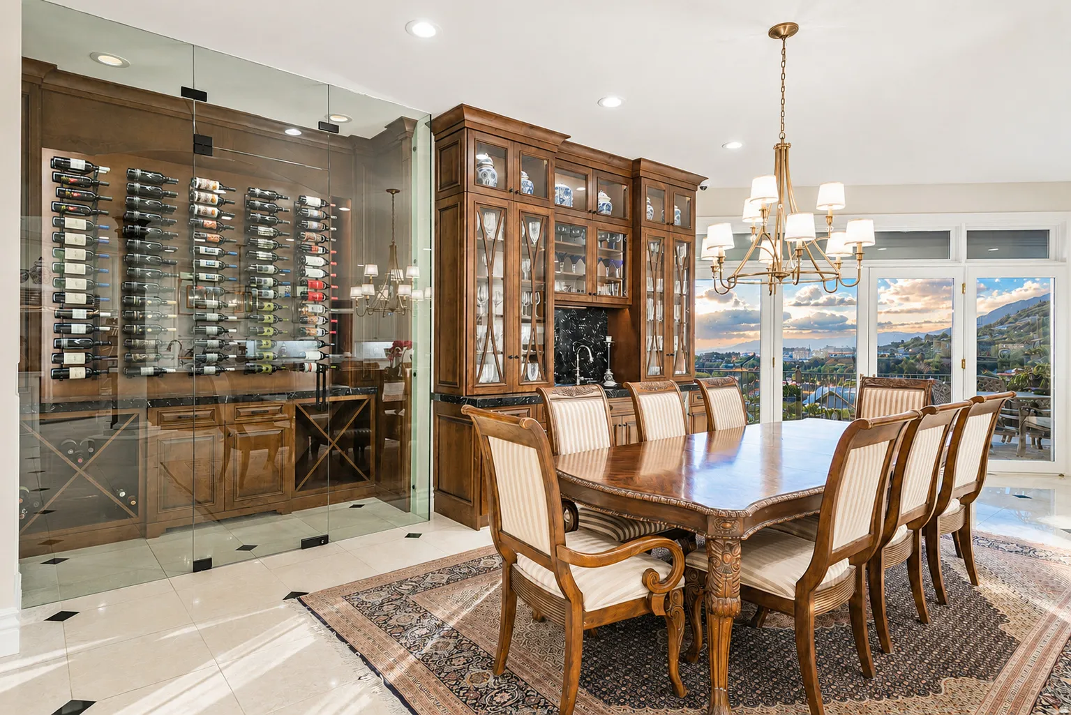 Dedicated wine cellar with glass enclosure, wood-finish cabinetry, and contemporary wine racking