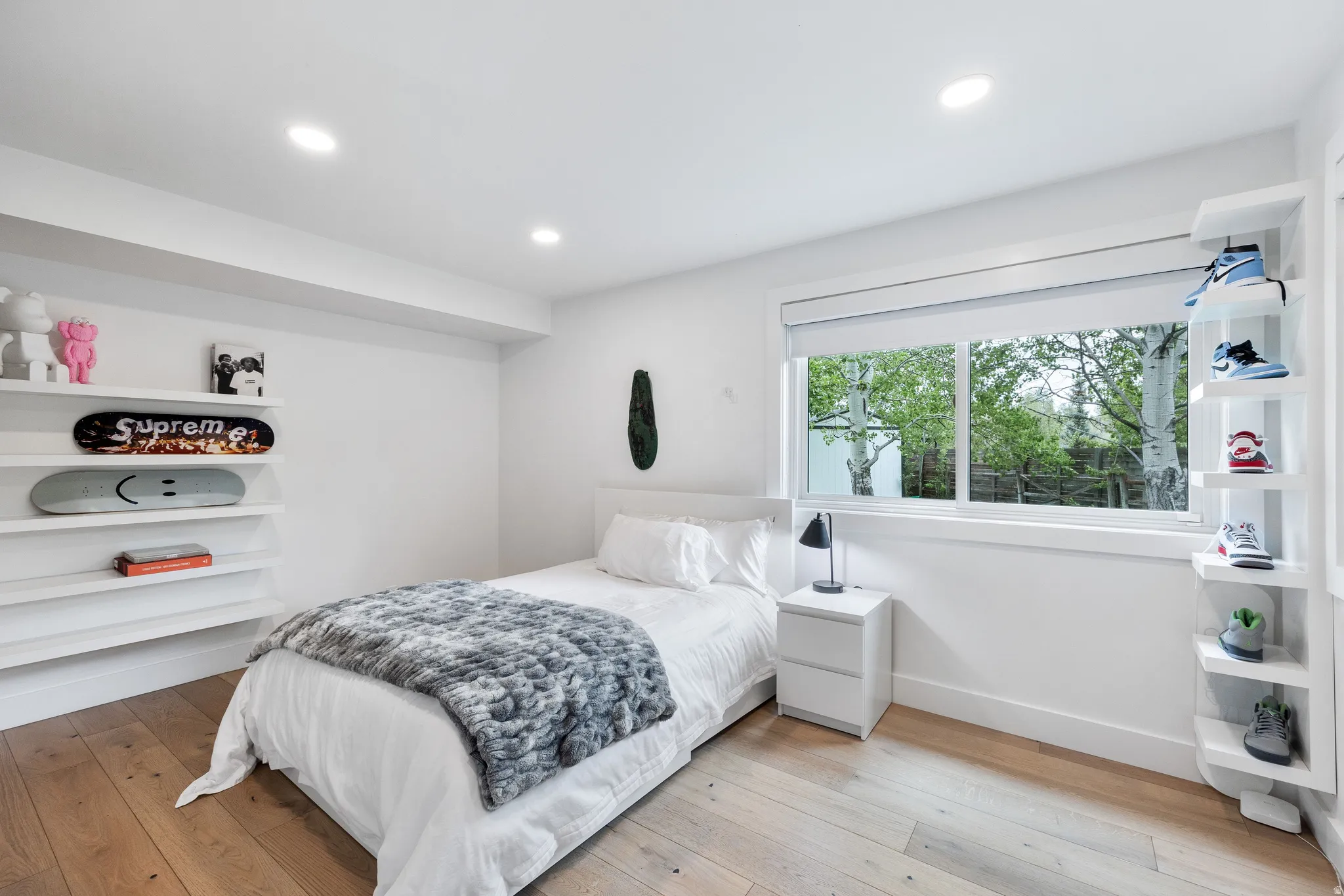Bright interior space with light wood-finish flooring