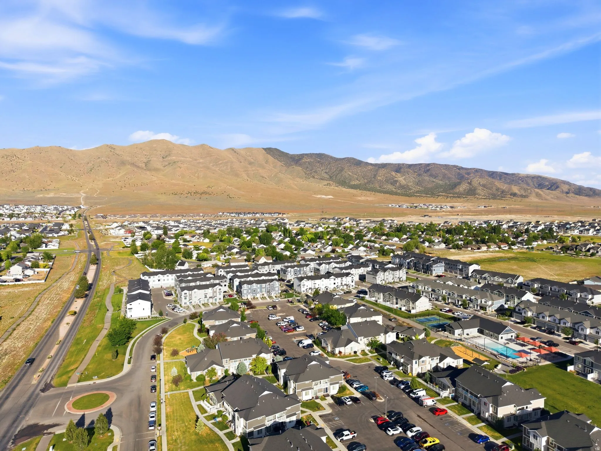 Aerial perspective showcasing a residential community with varied housing styles