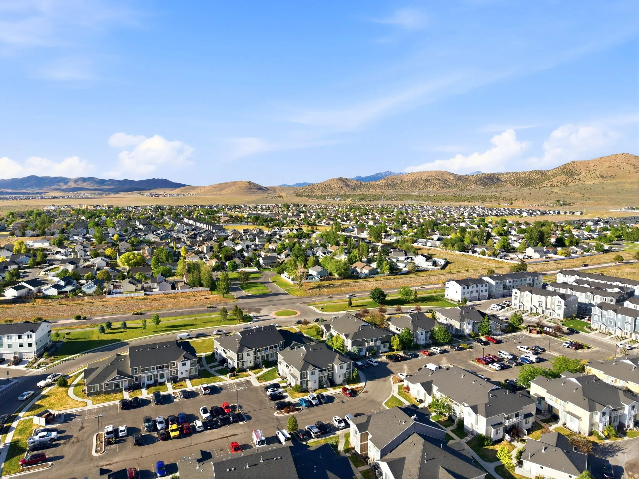 Aerial perspective showcasing a residential community with diverse housing styles
