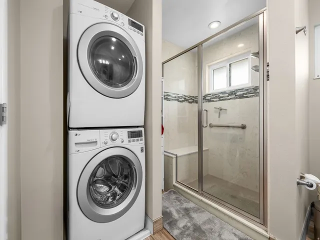 Stacked washer and dryer units