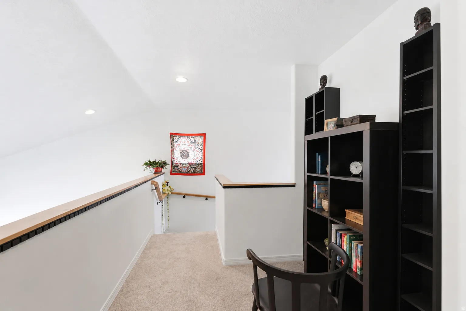 2nd floor landing space overlooking main floor living. Great Feature - Open w/natural lighting.