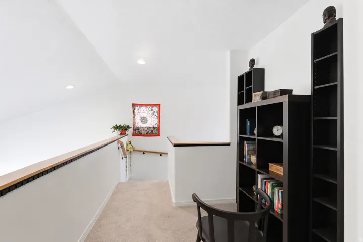 2nd floor landing space overlooking main floor living. Great Feature - Open w/natural lighting.