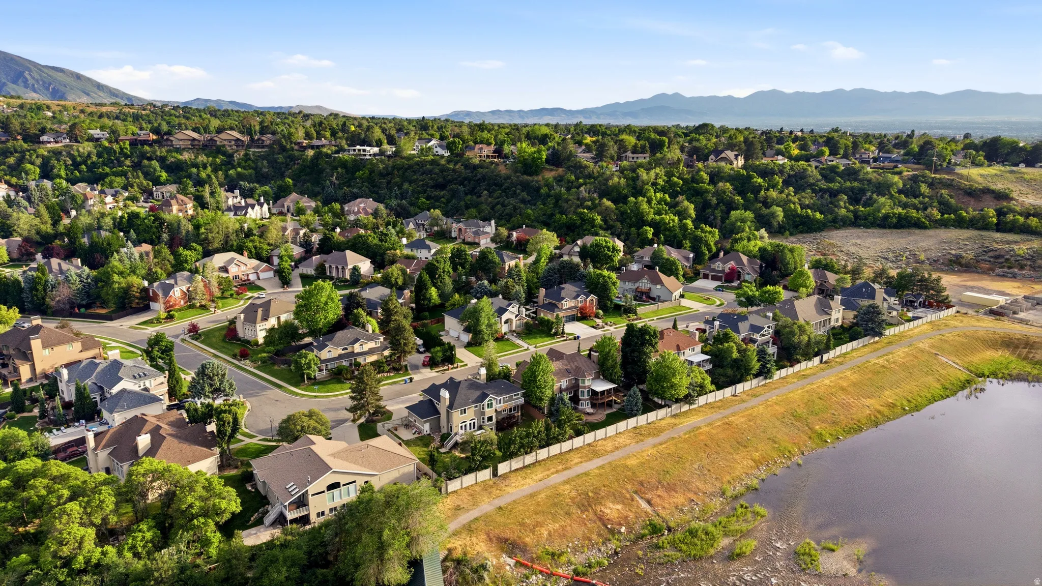 Expansive residential community with established homes featuring mature landscaping and paved streets