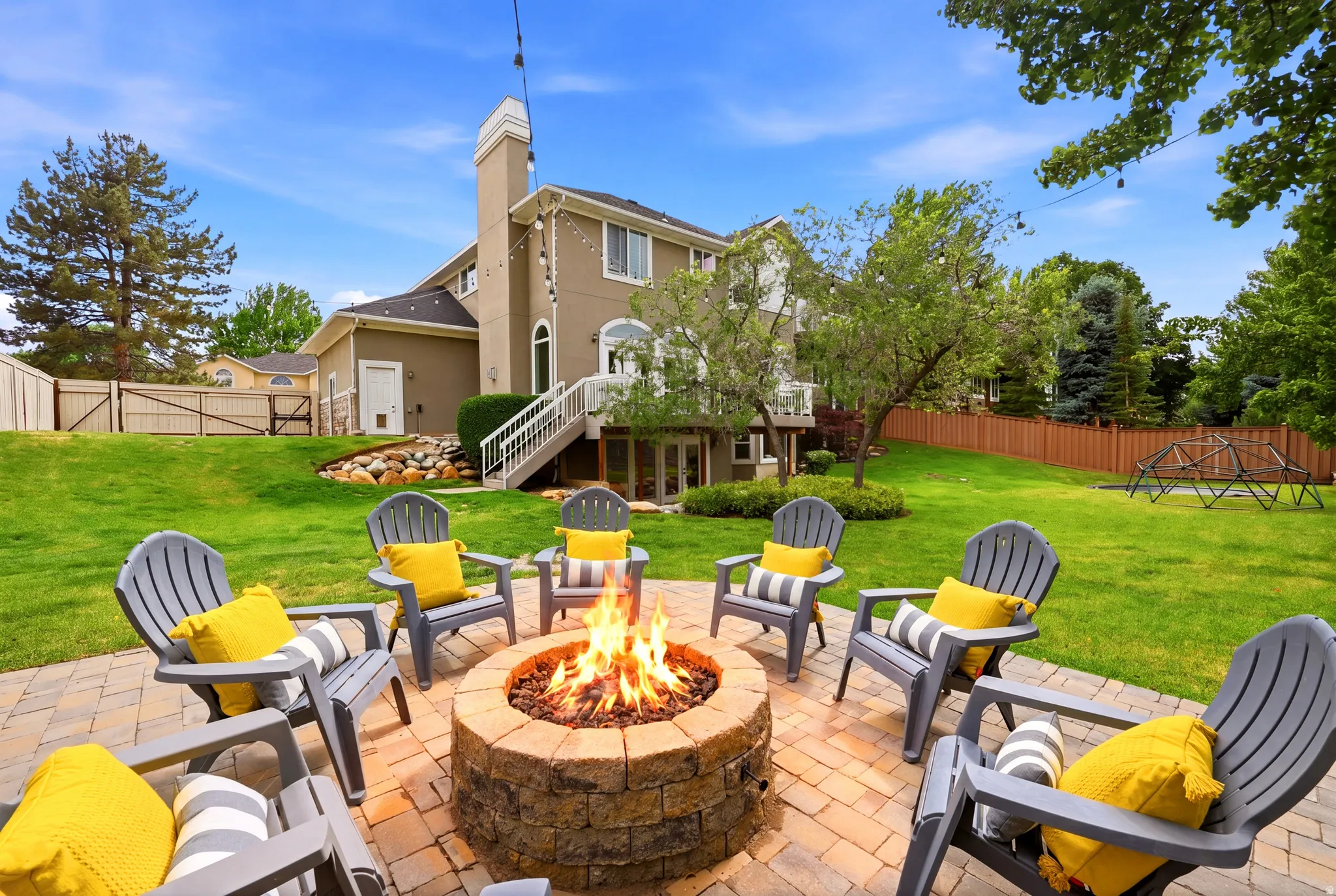 Paver patio with a stone fire pit