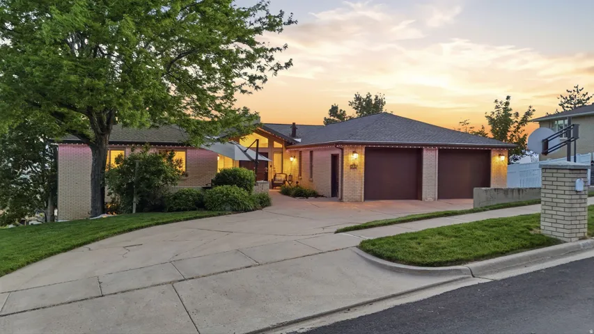 Contemporary brick exterior with a multi-car garage