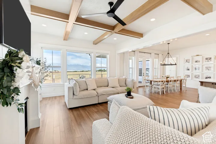 This inviting family room is the center of the home and the perfect place to relax, unwind and enjoy time together against a backdrop of gorgeous mountain views