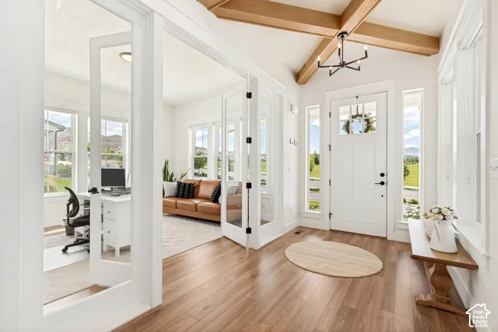 This warm, inviting light-filled entry is sure to make everyone feel welcome