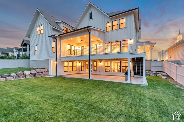 The spacious deck and perfectly manicured back yard offer the perfect backdrop for entertaining guests or enjoying a quiet evening