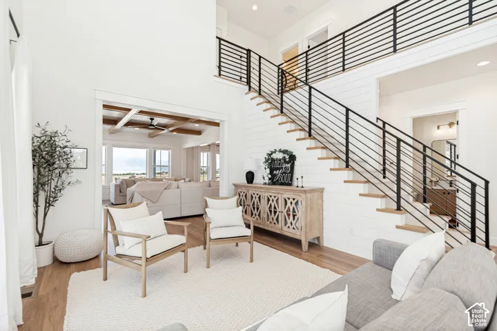 You'll love entertaining in this stunning living room with French doors leading out to a covered porch