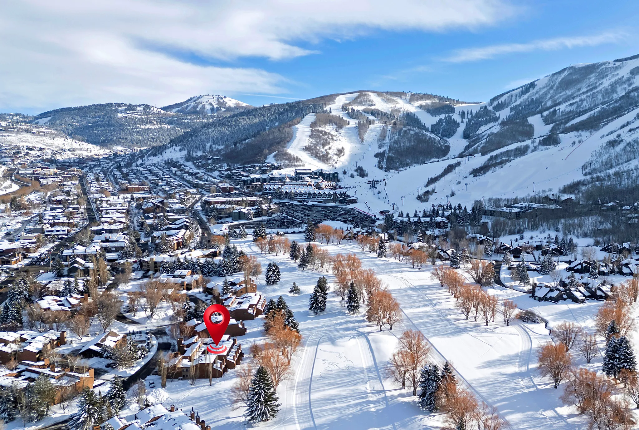 Aerial perspective showcasing a snow-covered mountainous region