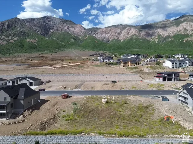 Mountainous terrain framing a developing residential area
