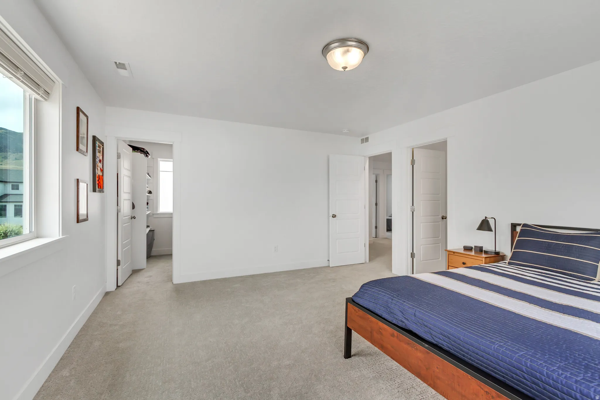Fourth bedroom upstairs has large walk-in closet.