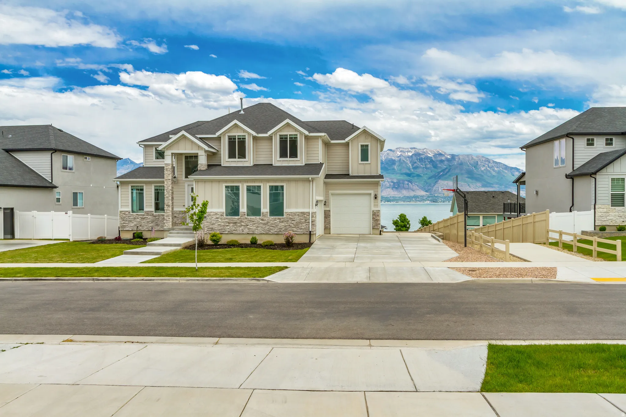 Two-story home with adjacent walkway to lake and community area park, playground and picnic area, just a block away.